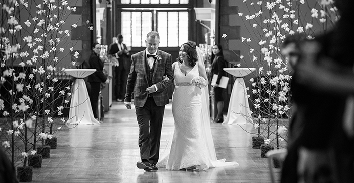 Bride walking down the aisle at Mansfield Traquair