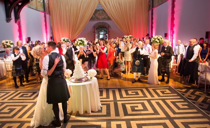 Elegant white spring wedding Edinburgh, cake cutting - photo credit ABM Photography 