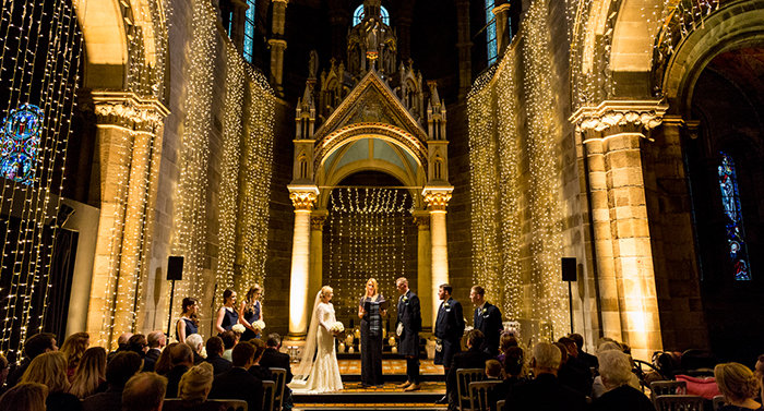 Fairy lights created a stunning backdrop for this wedding ceremony at Mansfield Traquair in Edinburgh. Photographer: Philip Stanley Dickson www.psdphotography.co.uk