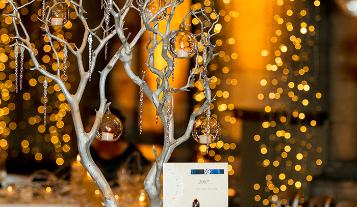 Tables were decorated with beautiful silver trees with hanging tea lights. Photographer: Philip Stanley Dickson www.psdphotography.co.uk