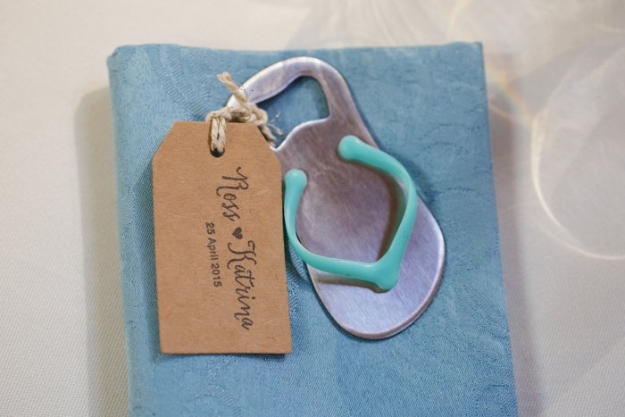 Very cool wedding favours - flip flop bottle openers | Photo credit Blue Sky Photography 