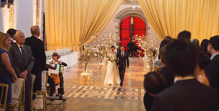 Kim walking down the aisle at Mansfield Traquair in Edinburgh. Photo credit: Kirsty Stroma Photography