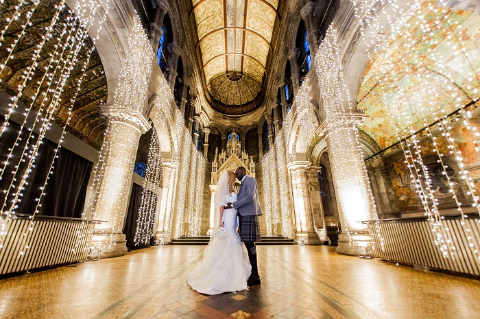 A wedding at Mansfield Traquair Edinburgh with a bride and groom dancing, fairy light created a beautiful backdrop for this couple's big day - photo credit Sean Bell Photography