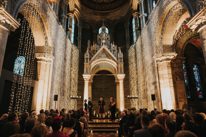 The happy couple exchanging vows amongst friends and family in Mansfield Tranquair, Edinburgh