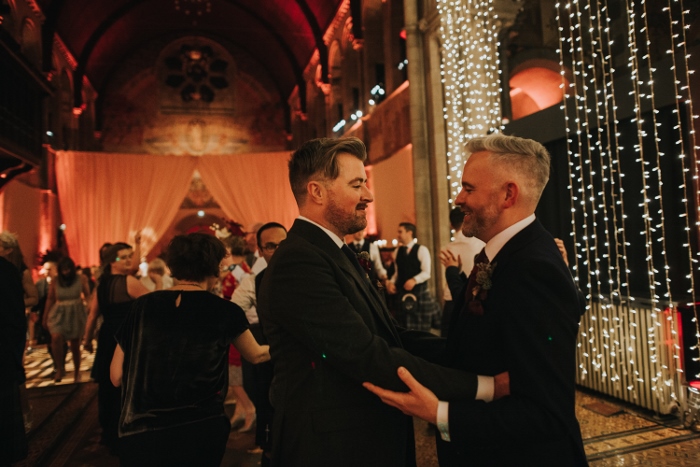 The newly wedded couple smiling at one another during their beautiful wedding in Mansfield Tranquair, Edinburgh